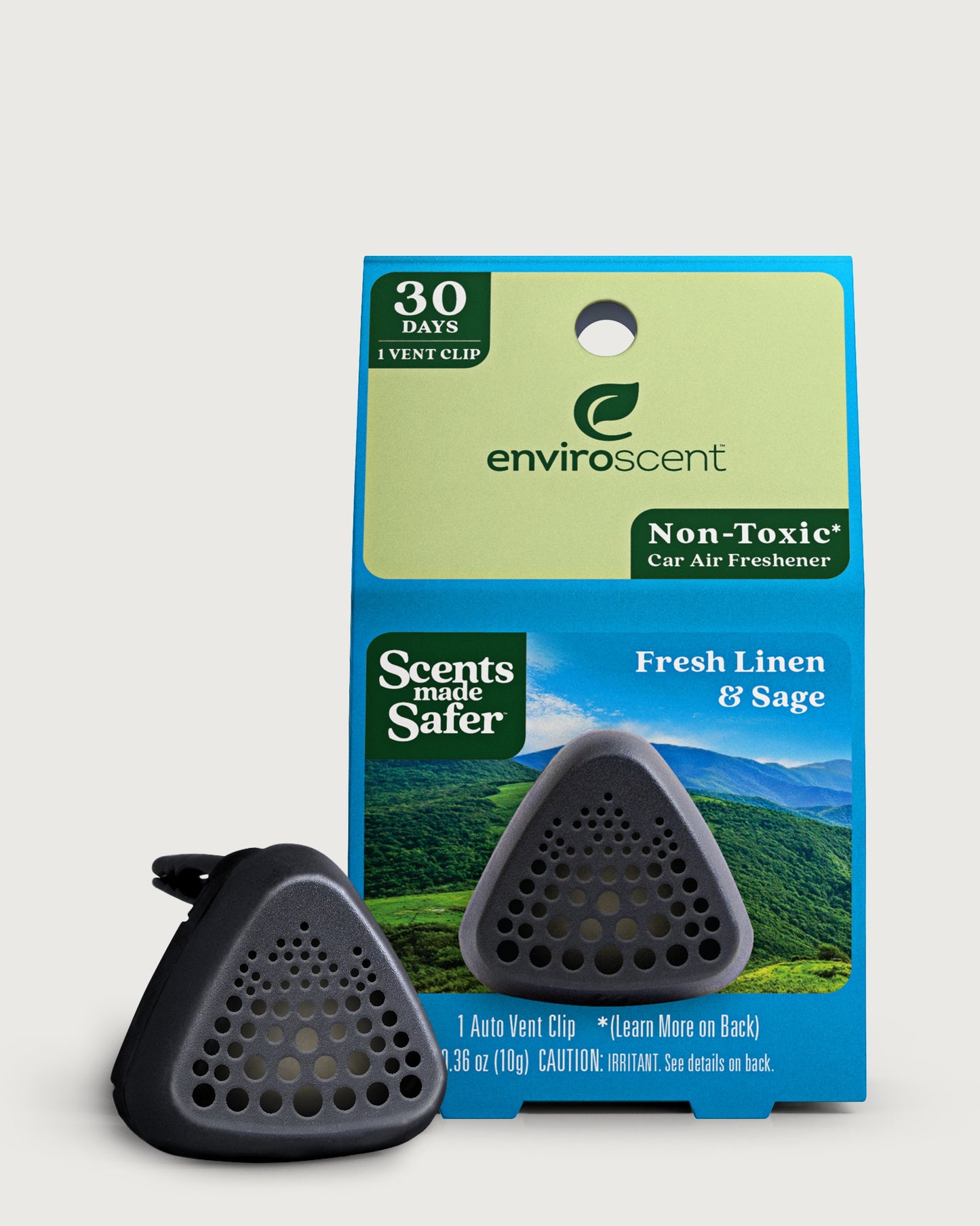 Enviroscent single use car vent clip in front of their retail packaging in Fresh Linen & Sage scent.