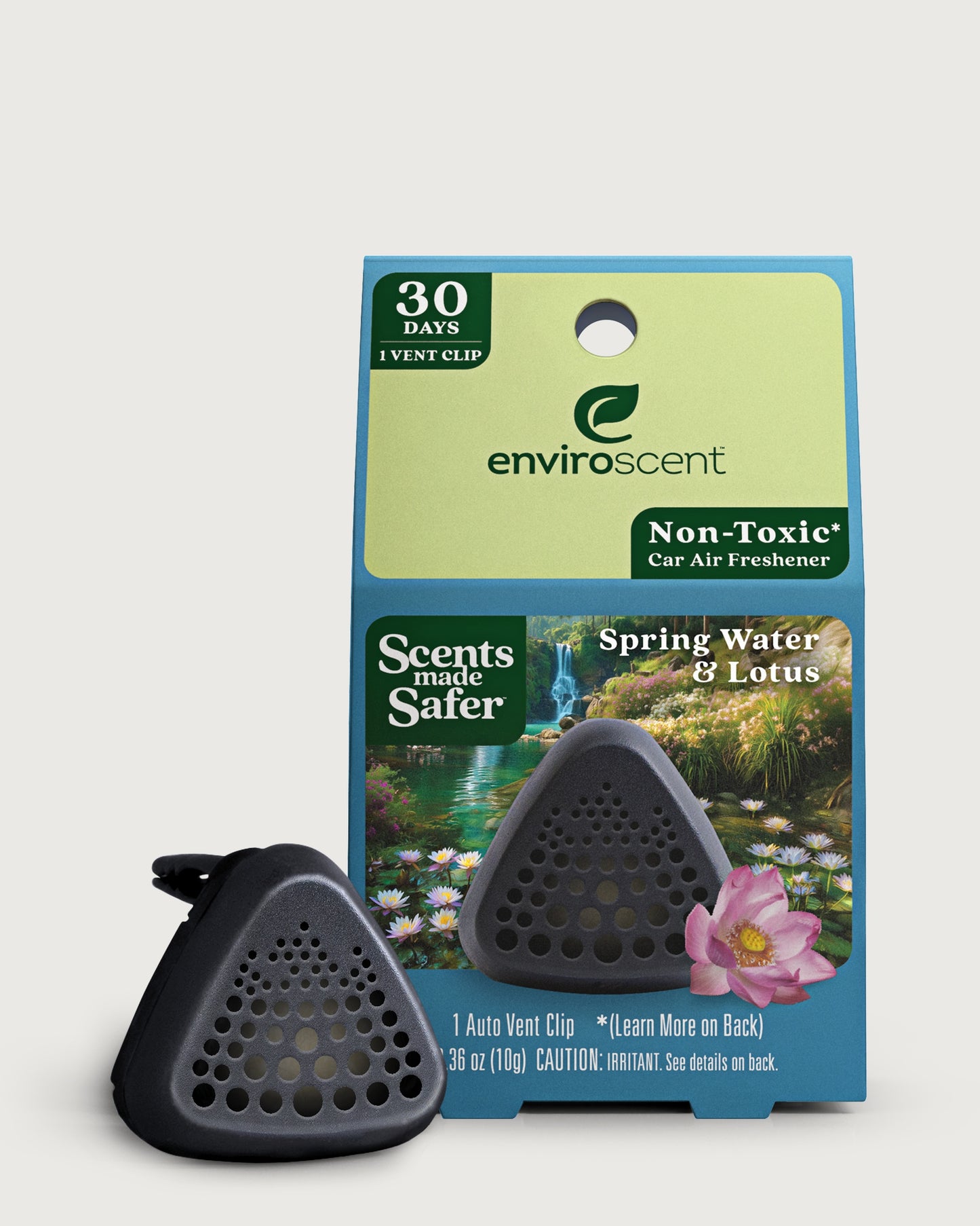 An Enviroscent car air freshener event clip shown with its retail packaging. Spring Water & Lotus scent.