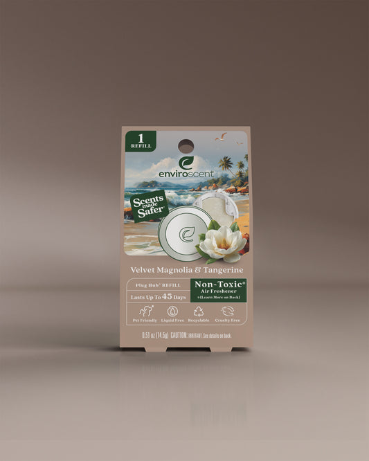 Enviroscent Velvet Magnolia & Tangerine Plug Hub refill in packaging on beige background